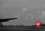 Image of F6F hellcats take off from the USS Hancock Pacific Ocean, 1944, second 28 stock footage video 65675055348
