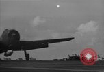Image of F6F hellcats take off from the USS Hancock Pacific Ocean, 1944, second 29 stock footage video 65675055348