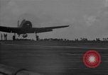 Image of F6F hellcats take off from the USS Hancock Pacific Ocean, 1944, second 34 stock footage video 65675055348