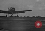 Image of F6F hellcats take off from the USS Hancock Pacific Ocean, 1944, second 35 stock footage video 65675055348