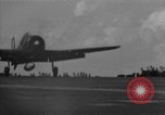 Image of F6F hellcats take off from the USS Hancock Pacific Ocean, 1944, second 36 stock footage video 65675055348
