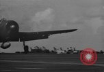Image of F6F hellcats take off from the USS Hancock Pacific Ocean, 1944, second 37 stock footage video 65675055348