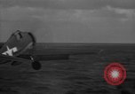 Image of F6F hellcats take off from the USS Hancock Pacific Ocean, 1944, second 46 stock footage video 65675055348