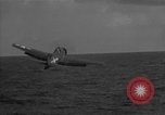 Image of F6F hellcats take off from the USS Hancock Pacific Ocean, 1944, second 60 stock footage video 65675055348