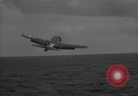 Image of F6F hellcats take off from the USS Hancock Pacific Ocean, 1944, second 61 stock footage video 65675055348