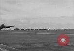 Image of Navy F6F aircraft take off from USS Hancock Pacific Ocean, 1944, second 24 stock footage video 65675055349