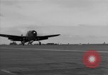 Image of Navy F6F aircraft take off from USS Hancock Pacific Ocean, 1944, second 26 stock footage video 65675055349