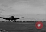 Image of Navy F6F aircraft take off from USS Hancock Pacific Ocean, 1944, second 29 stock footage video 65675055349