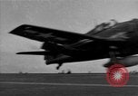 Image of Navy F6F aircraft take off from USS Hancock Pacific Ocean, 1944, second 31 stock footage video 65675055349
