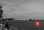 Image of Navy F6F aircraft take off from USS Hancock Pacific Ocean, 1944, second 35 stock footage video 65675055349