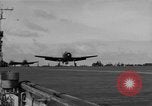Image of Navy F6F aircraft take off from USS Hancock Pacific Ocean, 1944, second 38 stock footage video 65675055349