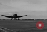 Image of Navy F6F aircraft take off from USS Hancock Pacific Ocean, 1944, second 39 stock footage video 65675055349