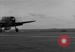 Image of Navy F6F aircraft take off from USS Hancock Pacific Ocean, 1944, second 40 stock footage video 65675055349