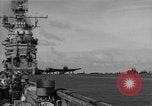 Image of Navy F6F aircraft take off from USS Hancock Pacific Ocean, 1944, second 44 stock footage video 65675055349