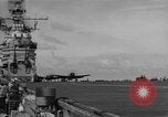 Image of Navy F6F aircraft take off from USS Hancock Pacific Ocean, 1944, second 45 stock footage video 65675055349