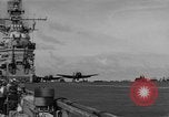 Image of Navy F6F aircraft take off from USS Hancock Pacific Ocean, 1944, second 46 stock footage video 65675055349
