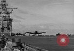 Image of Navy F6F aircraft take off from USS Hancock Pacific Ocean, 1944, second 47 stock footage video 65675055349