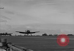 Image of Navy F6F aircraft take off from USS Hancock Pacific Ocean, 1944, second 48 stock footage video 65675055349