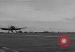 Image of Navy F6F aircraft take off from USS Hancock Pacific Ocean, 1944, second 49 stock footage video 65675055349