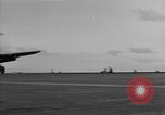 Image of Navy F6F aircraft take off from USS Hancock Pacific Ocean, 1944, second 54 stock footage video 65675055349