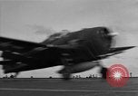 Image of Navy F6F aircraft take off from USS Hancock Pacific Ocean, 1944, second 55 stock footage video 65675055349