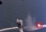 Standbild Flugzeuge aus USS Cowpens (CVL-25) Angriff japanischer Kreuzer Naka Pacific Theater, 1944, aus Sekunde 12 historischem Filmmaterial Videoclip 65675055351