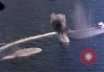 Standbild Flugzeuge aus USS Cowpens (CVL-25) Angriff japanischer Kreuzer Naka Pacific Theater, 1944, aus Sekunde 13 historischem Filmmaterial Videoclip 65675055351