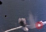 Standbild Flugzeuge aus USS Cowpens (CVL-25) Angriff japanischer Kreuzer Naka Pacific Theater, 1944, aus Sekunde 14 historischem Filmmaterial Videoclip 65675055351