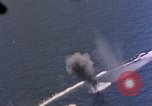 Standbild Flugzeuge aus USS Cowpens (CVL-25) Angriff japanischer Kreuzer Naka Pacific Theater, 1944, aus Sekunde 17 historischem Filmmaterial Videoclip 65675055351