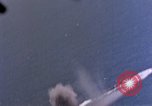 Standbild Flugzeuge aus USS Cowpens (CVL-25) Angriff japanischer Kreuzer Naka Pacific Theater, 1944, aus Sekunde 18 historischem Filmmaterial Videoclip 65675055351