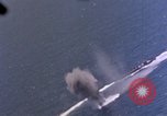 Standbild Flugzeuge aus USS Cowpens (CVL-25) Angriff japanischer Kreuzer Naka Pacific Theater, 1944, aus Sekunde 19 historischem Filmmaterial Videoclip 65675055351