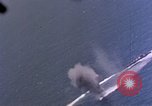 Standbild Flugzeuge aus USS Cowpens (CVL-25) Angriff japanischer Kreuzer Naka Pacific Theater, 1944, aus Sekunde 20 historischem Filmmaterial Videoclip 65675055351