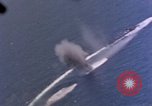 Standbild Flugzeuge aus USS Cowpens (CVL-25) Angriff japanischer Kreuzer Naka Pacific Theater, 1944, aus Sekunde 22 historischem Filmmaterial Videoclip 65675055351