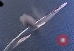 Standbild Flugzeuge aus USS Cowpens (CVL-25) Angriff japanischer Kreuzer Naka Pacific Theater, 1944, aus Sekunde 23 historischem Filmmaterial Videoclip 65675055351