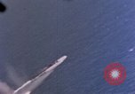 Standbild Flugzeuge aus USS Cowpens (CVL-25) Angriff japanischer Kreuzer Naka Pacific Theater, 1944, aus Sekunde 24 historischem Filmmaterial Videoclip 65675055351