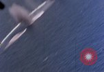 Standbild Flugzeuge aus USS Cowpens (CVL-25) Angriff japanischer Kreuzer Naka Pacific Theater, 1944, aus Sekunde 26 historischem Filmmaterial Videoclip 65675055351