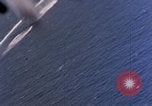 Standbild Flugzeuge aus USS Cowpens (CVL-25) Angriff japanischer Kreuzer Naka Pacific Theater, 1944, aus Sekunde 27 historischem Filmmaterial Videoclip 65675055351