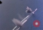 Standbild Flugzeuge aus USS Cowpens (CVL-25) Angriff japanischer Kreuzer Naka Pacific Theater, 1944, aus Sekunde 29 historischem Filmmaterial Videoclip 65675055351