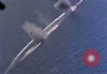 Standbild Flugzeuge aus USS Cowpens (CVL-25) Angriff japanischer Kreuzer Naka Pacific Theater, 1944, aus Sekunde 31 historischem Filmmaterial Videoclip 65675055351