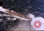 Standbild Flugzeuge aus USS Cowpens (CVL-25) Angriff japanischer Kreuzer Naka Pacific Theater, 1944, aus Sekunde 36 historischem Filmmaterial Videoclip 65675055351