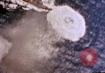 Standbild Flugzeuge aus USS Cowpens (CVL-25) Angriff japanischer Kreuzer Naka Pacific Theater, 1944, aus Sekunde 37 historischem Filmmaterial Videoclip 65675055351