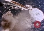 Standbild Flugzeuge aus USS Cowpens (CVL-25) Angriff japanischer Kreuzer Naka Pacific Theater, 1944, aus Sekunde 38 historischem Filmmaterial Videoclip 65675055351