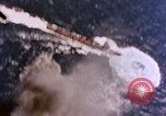 Standbild Flugzeuge aus USS Cowpens (CVL-25) Angriff japanischer Kreuzer Naka Pacific Theater, 1944, aus Sekunde 39 historischem Filmmaterial Videoclip 65675055351