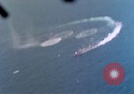 Standbild Flugzeuge aus USS Cowpens (CVL-25) Angriff japanischer Kreuzer Naka Pacific Theater, 1944, aus Sekunde 59 historischem Filmmaterial Videoclip 65675055351