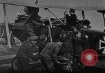 Image of Loading bombs in cockpit of German airplane France, 1917, second 1 stock footage video 65675055374