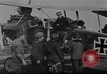 Image of Loading bombs in cockpit of German airplane France, 1917, second 7 stock footage video 65675055374