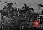 Image of Loading bombs in cockpit of German airplane France, 1917, second 8 stock footage video 65675055374
