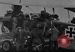 Image of Loading bombs in cockpit of German airplane France, 1917, second 9 stock footage video 65675055374