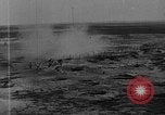Image of Loading bombs in cockpit of German airplane France, 1917, second 15 stock footage video 65675055374
