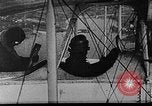 Image of Loading bombs in cockpit of German airplane France, 1917, second 17 stock footage video 65675055374